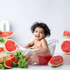 Watermelons are the smiles of summer. This fun and unique tub bath theme with fresh watermelons is perfect for a summer baby.