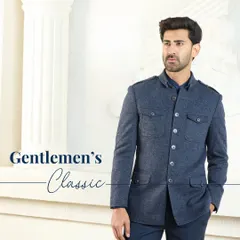 Gentleman's Classic. The navy blue co-ord set, featuring a structured jacket with shoulder epaulets and chest pockets, is a harmonious blend of elegance and refinement.