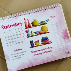 A close-up of the September page from my 2023 calendar. The theme is 'Happiness is collecting amazing cookwares', with a notes section and a list of holidays for the month.