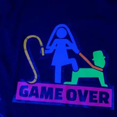 A close-up of the "Game Over" T-shirt under blacklight, showing how the neon paints glow for a party-ready effect.