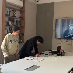 Two of our architects, Riya Choudhury and Bhumika Arora, collaborating in the conference room. Teamwork is essential to tracing the evolution of an idea from concept to completion.