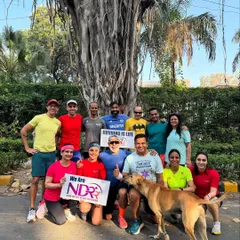 Another great group shot under the banyan tree. We hold up our signs with pride because we are the New Delhi Road Runners, and for us, running truly is life.