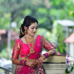 The beautiful bride-to-be Tanu in her pink engagement lehenga, captured in a moment of quiet elegance.