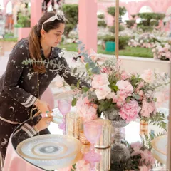 A behind-the-scenes moment of me adding the final touches to a tablescape in Doha. A wedding set is the calm after the storm of planning and execution, and seeing it all come together is the most rewarding part of my job.