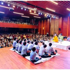 A wide view of the auditorium at St. Xavier's High School, Gurgaon, during a morning concert for students. I perform in various educational institutions to promote our cultural heritage.