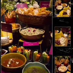 This collage captures the variety within a single grazing station. It shows close-ups of house-made dips, fresh vegetable crudités in individual glasses, artisanal cheese boards, and baskets of fresh bread, highlighting the depth of the offering.