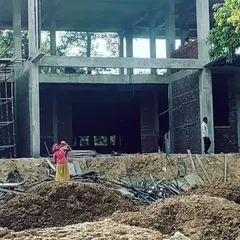 Another angle of the farmhouse construction, highlighting the open, double-height spaces that will eventually look out onto the landscape. The raw structure reveals the hierarchies of space within the design.