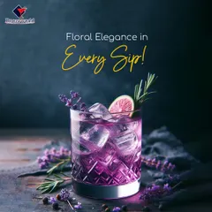 Floral elegance in every sip. This lavender-hued cocktail was designed for Valentine's Day, using edible flowers and herbs to create an enchanting and romantic drink.