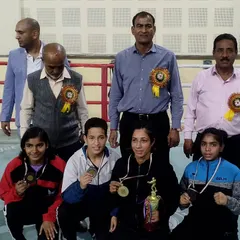 Our female boxers proudly displaying their medals and trophy at the Delhi State Boxing Championship in 2023. We have a strong team of women fighters who consistently perform at the top level.