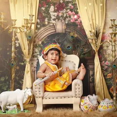Even little gods need to kick their feet up. This playful shot captures the fun side of a Krishna-themed photoshoot, complete with a miniature cow and makhan pot props.