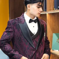 For a client who wants to make an entrance, I designed this custom three piece tuxedo. The deep purple fabric with its unique geometric pattern and black satin lapels is for the man who isn't afraid of bold style.