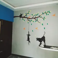 A playful mural for a child's room or family space, featuring cat silhouettes on a tree branch. I can create custom themes to match your family's personality.