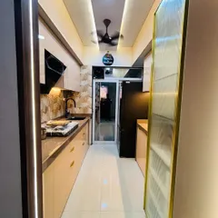 This image shows a classic parallel or galley kitchen layout, ideal for long, narrow spaces. The design features two parallel counters, creating an efficient workflow corridor.
