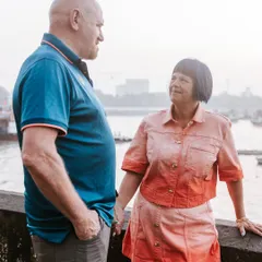 A quiet conversation by the sea wall. I look for these unscripted moments that reveal the genuine connection between two people.