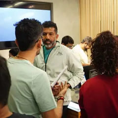 A behind-the-scenes moment, coordinating with the team and guests before the ASICS press launch. Smooth execution is the result of meticulous planning and communication.