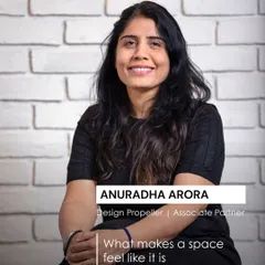 A portrait of Anuradha Arora, our Design Propeller and Associate Partner. Her philosophy centers on creating spaces that feel instantly familiar and lived-in, turning a show apartment into a place that sparks a quiet sense of belonging.