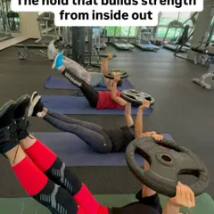 This is not just an ab workout; it's an isometric leg raise with a weight plate that builds a rock solid core from the inside out. This hold improves stability and endurance, which is crucial for heavier lifts.