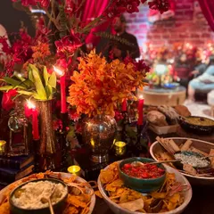 A closer view of our 'Night in Brooklyn' setup, featuring an array of gourmet dips, salsas, and chips. We focus on abundance and variety, ensuring there's a delicious bite for every guest.