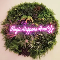 Magic really happens here. For this project, I created a circular artificial green wreath and integrated a custom neon sign to make a fun and Instagrammable feature wall.