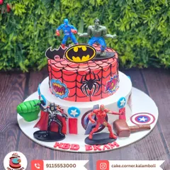 This two-tier superhero cake is packed with action, featuring Spiderman, Batman, Thor, Iron Man, Captain America, and the Hulk. A perfect centerpiece for a superhero-themed birthday party.