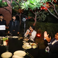 The moment of the big reveal. The applause and smiles from the guests at this corporate dinner show that the prediction was a huge success.