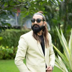 Another look at my personal style. The man bun, beard, and sunglasses are all part of the 'Dancing Bartender' persona that guests love.