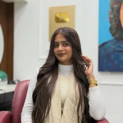This is what I call an "expensive brunette" look. A deep, decadent chocolate brown on very long hair, styled to show off its health and shine.