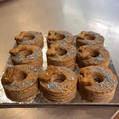 A fresh batch of dognuts ready for a weekend treat. I offer both vegetarian and non-vegetarian options to suit every dog's preference.