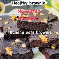 My healthy banana oats brownies are a customer favourite. They are completely free of maida and butter, getting their fudgy texture from bananas and oats, and are topped with crunchy walnuts.