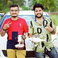 On a shoot with a colleague. For bigger projects, we often bring multiple drones to capture different angles simultaneously or to have a backup ready to go.