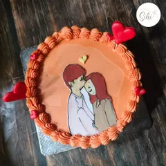 Edible sketching is such a fun way to bring out the creative side. This bento cake features a sweet, hand-drawn illustration of a couple.