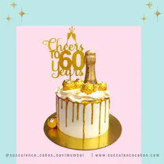 Cheers to 60 years! This celebratory cake features a gold drip, a miniature champagne bottle, and Ferrero Rocher chocolates. It’s a fun and festive design to honor a remarkable 60th birthday milestone.