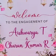 A personalized welcome sign for an engagement, featuring a lovely pink floral design to match the event's decor.