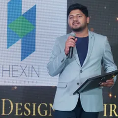 Our founder, Haricharan K V, speaking after being honored with the "Creative Designing Firm of the Year" award. This recognition is a reflection of our entire team's collective effort and passion for delivering exceptional projects.