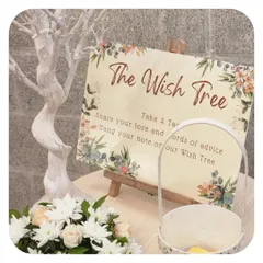 A 'Wish Tree' installation, an interactive element for guests. We provide a beautifully decorated tree where guests can hang their well wishes and notes of advice for the couple, creating a memorable keepsake.