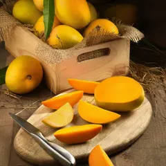 Nothing says summer like mangoes. For this shot, I used warm, directional lighting to emphasize the rich color and juicy texture of the fruit, creating a classic, appetizing food portrait.
