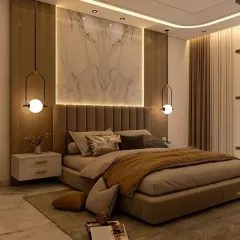 For this master bedroom, our goal was to create a warm and luxurious retreat. We achieved this with a rich color palette, a floor-to-ceiling upholstered headboard with marble and wood-paneled accents, and layered lighting from statement pendant lamps. The design focuses on creating a comfortable, elegant space for rest and relaxation.