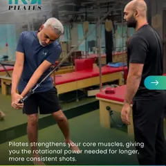 Pilates strengthens your core muscles, giving you the rotational power needed for longer, more consistent shots in golf. This client is simulating a swing using the Cadillac tower.