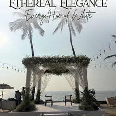 I design ceremonies that harmonize with their surroundings. This ethereal beachside mandap, crafted with delicate white florals and sheer drapes, stands as a testament to minimalist elegance, allowing the beauty of the ocean and the sky to become part of the sacred space.