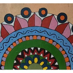 A semi-circular mandala-style mural with intricate patterns and a vibrant colour scheme. This type of design adds a spiritual or bohemian touch to a space.