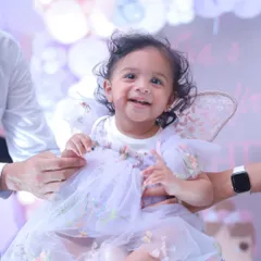 A beautiful, happy smile from the birthday girl. We make sure to get those lovely solo portraits amidst the party fun, capturing the sweet personality of your little one.