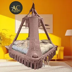 Our rectangular bed swing, shown here in a soft dusty rose color. This luxurious swing invites restful moments and is perfect for sleeping like a baby.