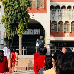 Leading a session from the steps of the school building at SKV Noor Nagar. I adapt my training to any space available to ensure the students get the most out of our time together.