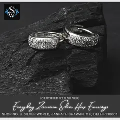 These everyday wear zirconia hoop earrings are made from certified 92.5 silver. The high-grade zirconia stones are pave-set to create a continuous sparkle, and the rhodium plating prevents tarnishing.