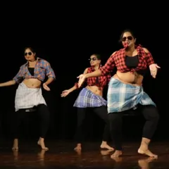 Our 'Rowdy Baby' performance is always a hit! We mixed belly dance with the street style of Tapang, complete with lungis and sunglasses. It's a super fun, high-energy act that brings a playful vibe to any event.