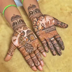 This design showcases a variety of my favorite motifs in one. It includes peacocks, elephants, and palace domes, all tied together with intricate floral and geometric patterns for a full and festive look.