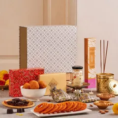 A delightful assortment for the festival of lights, this hamper includes traditional Indian snacks like murukku and laddoos, incense sticks, and chocolates, ready to be shared with loved ones.