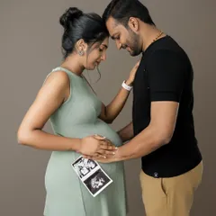 Your story is in the details. Bringing personal items like your first ultrasound scan adds a deeply meaningful touch to your couple's maternity session, celebrating your baby from the very first glimpse.