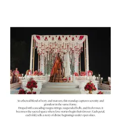 This mandap, draped with cascading mogra strings, suspended bells, and fresh roses, is a sacred space where love stories begin their forever. The design captures an ethereal blend of ivory and maroon, creating a feeling of serenity and grandeur.