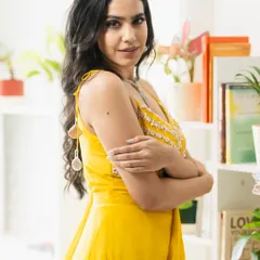 A confident pose in the same yellow outfit, showing how I can bring a modern and fresh energy to contemporary ethnic wear.